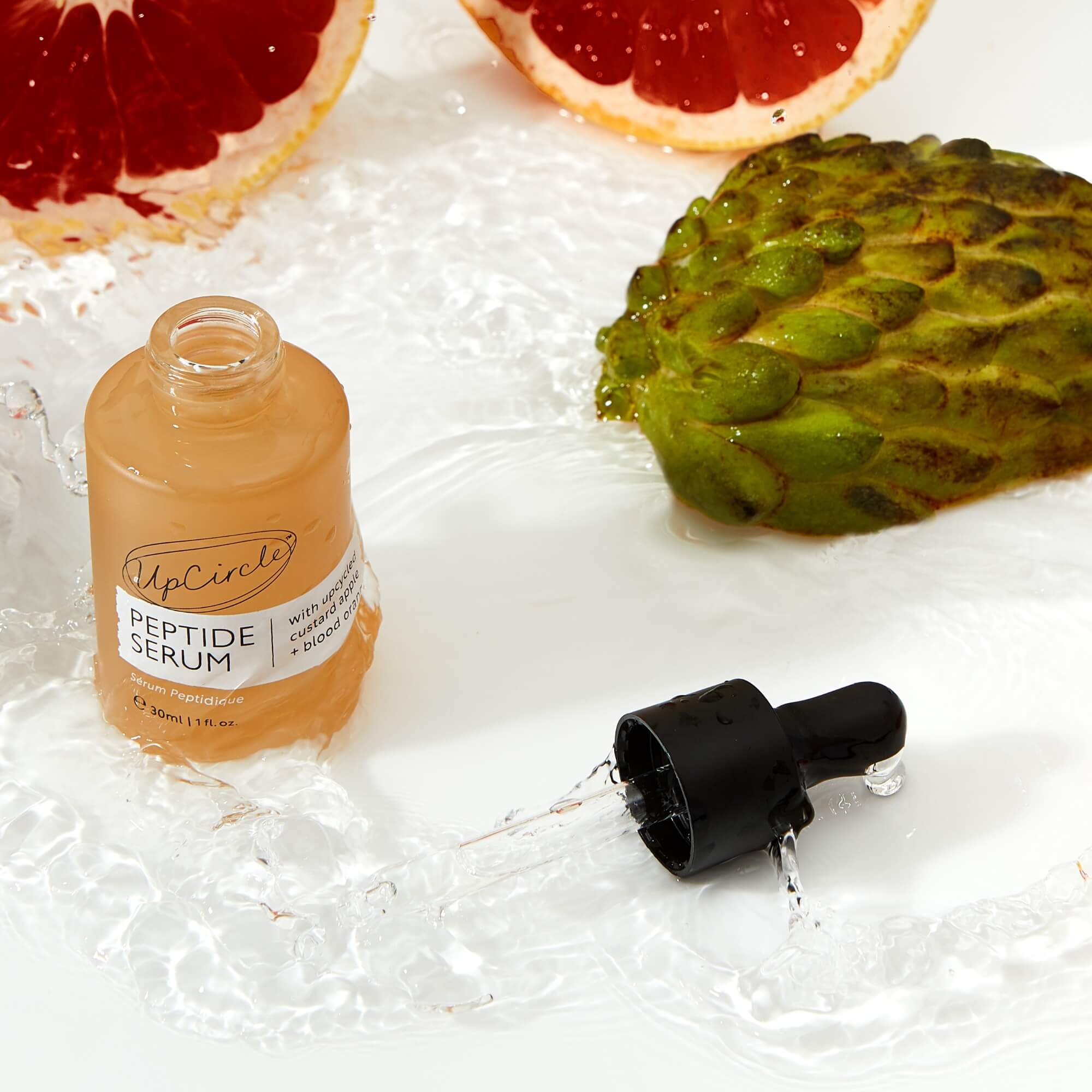 Peptide serum with upcycled custard apple and blood orange