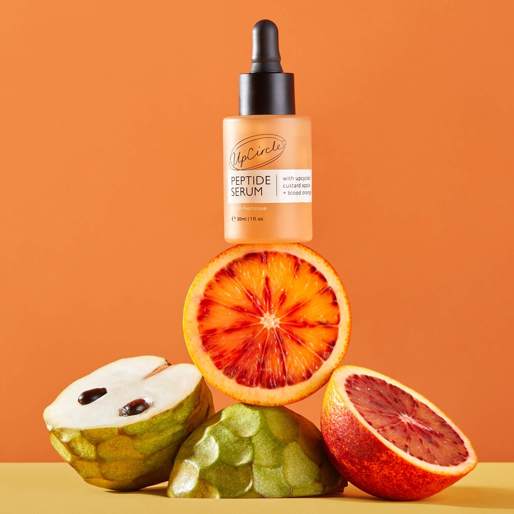Peptide serum with upcycled custard apple and blood orange